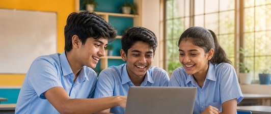 School students in uniform building their first program together on a laptop